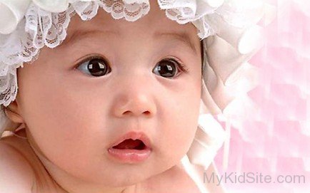 Cute Baby Girl In Hat