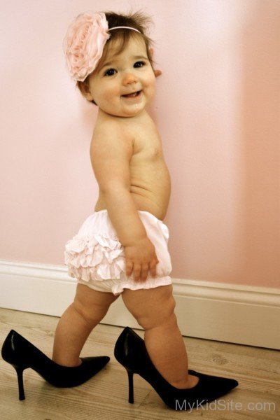 Cute Baby Girl Wearing Black Heel