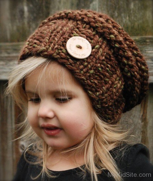 Cute Baby Girl Wearing Brown Hat