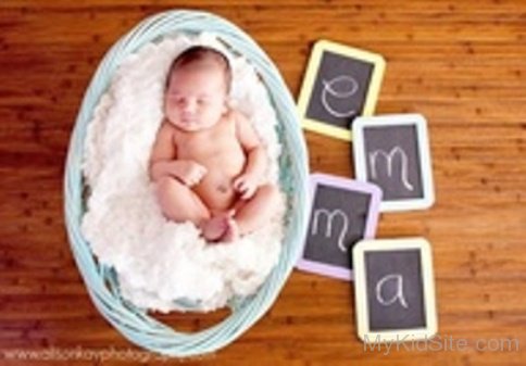 Cute Baby In Basket