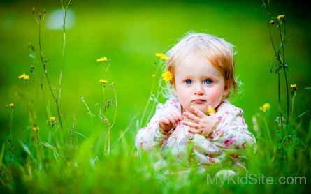 Cute Baby In Garden