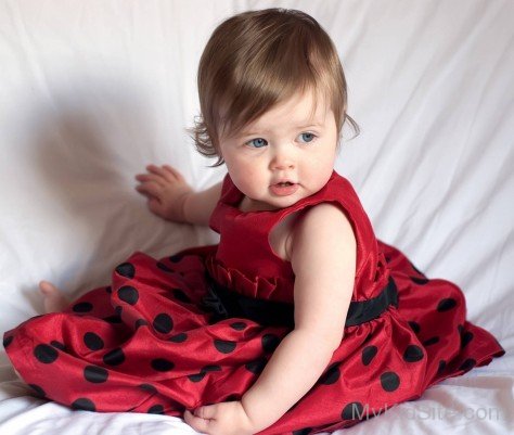 Cute Baby In Red Dress