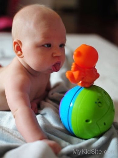 Cute Baby Playing With Toy