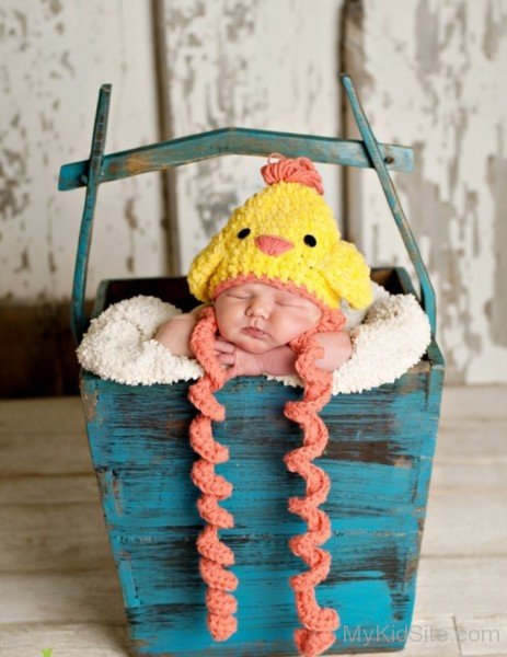 Cute Baby Sleeping In Basket