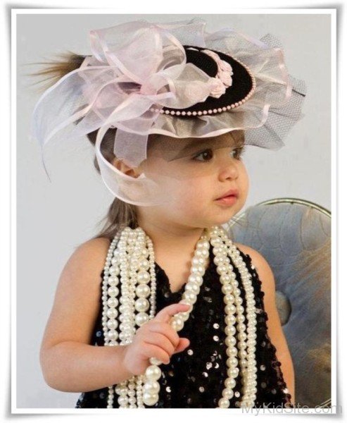 Cute Baby Wearing Black Hat