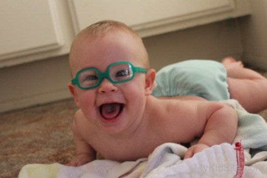 Cute Baby Wearing Green Glasses
