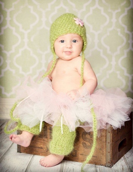 Cute Baby Wearing Green Woolen Hat