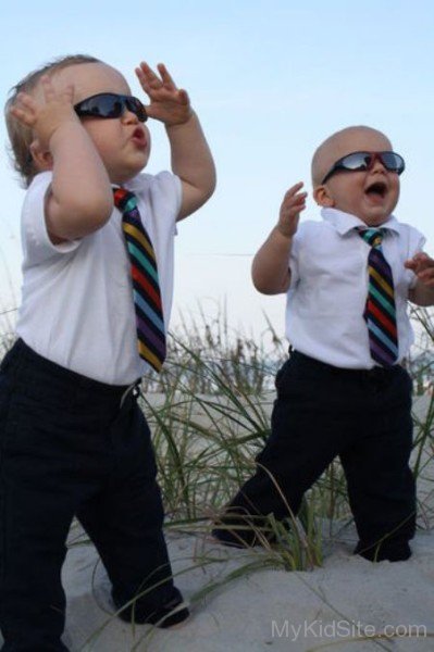 Two Baby Boy Laughing