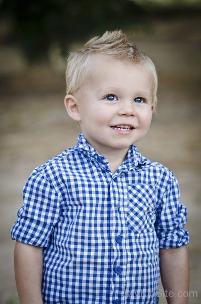 Baby Boy In Blue Shirt