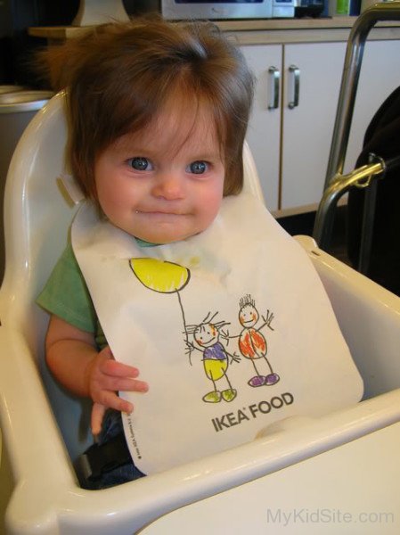 Baby Girl On Chair