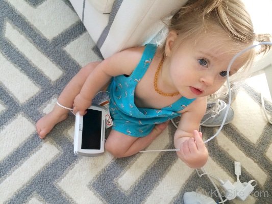 Baby Holding Vedio Game