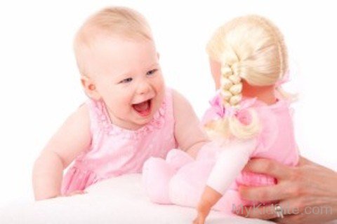 Baby Laughing At Doll