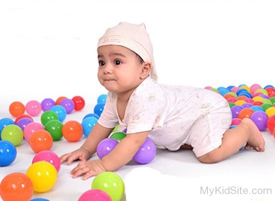 Baby Playing With Balls