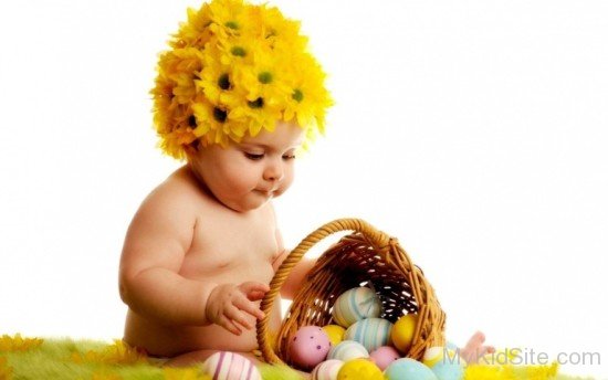 Cute Baby Playing  With Egg Basket