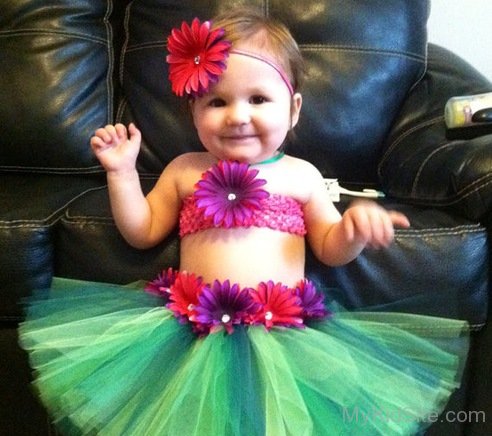 Cute Baby Girl In Green Dress