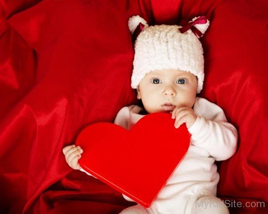  Baby Holding Heart Shape