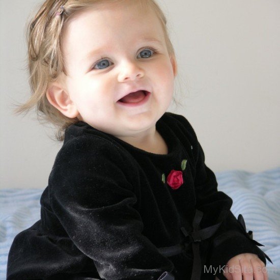 Baby Girl In Black Dress