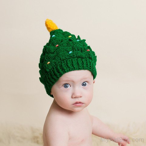 Cute Baby Wearing Christmas Tree Hat