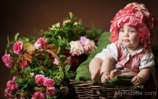 Cute Baby In Flower Basket