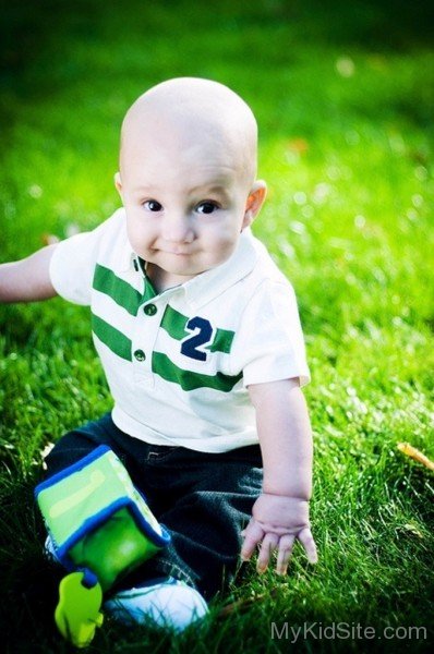 Cute Baby In Garden