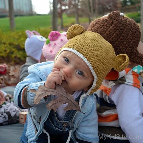 Cute Baby In Organic Tan Crochet Bear Hat