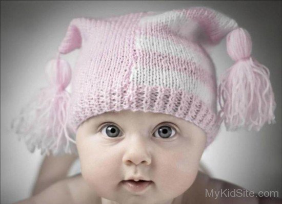 Cute Baby In Pink Winter Cap