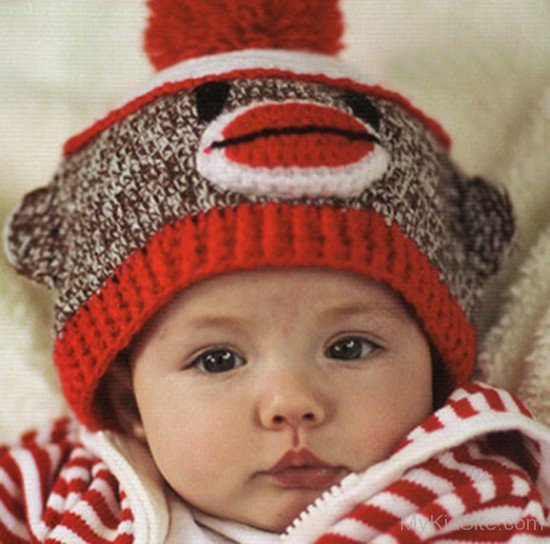 Cute Baby In Red Cap