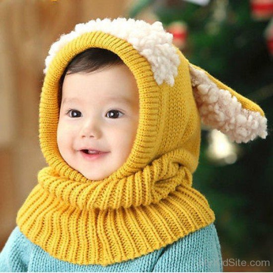 Cute Baby In Yellow Cap