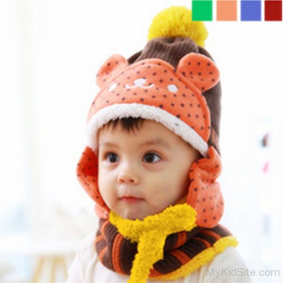 Cute Baby Wearing Orange Hat