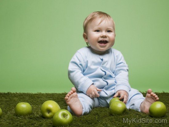 Baby With Green Apple