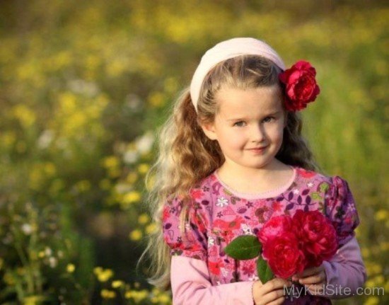 Cute Girl Holding Roses