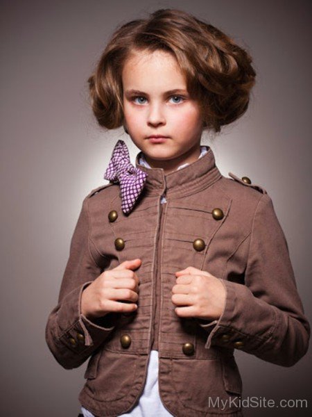 Cute Girl In Brown Coat