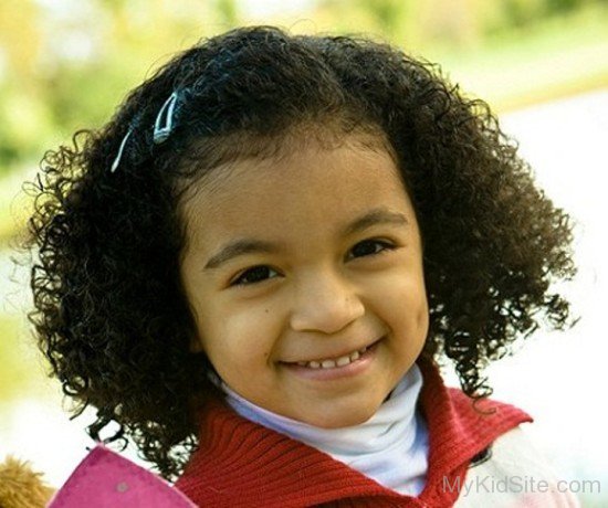 Cute Girl With Curly Hair