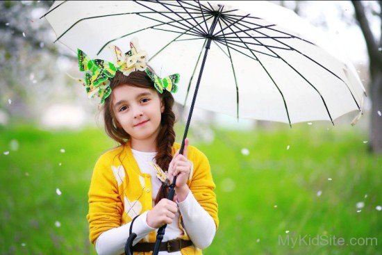 Cute Kid Holding Umbrella