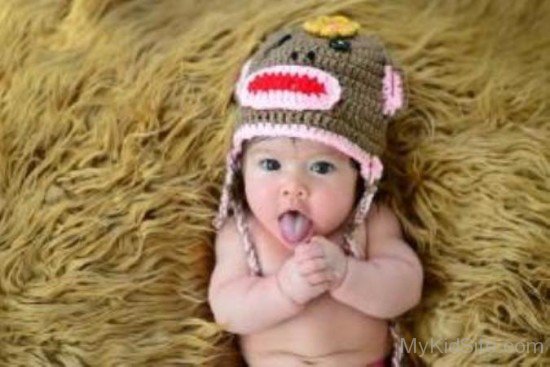Baby Girl Showing Tongue