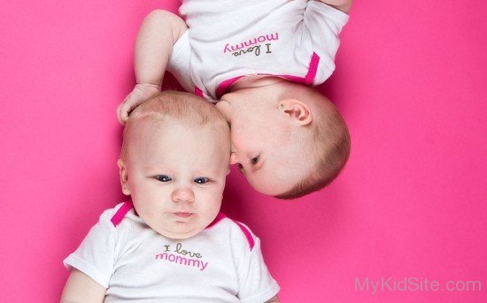 Cute Twins Biting