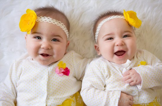 Twins Smiling