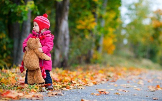 Delightful Baby With Teddy In Garden