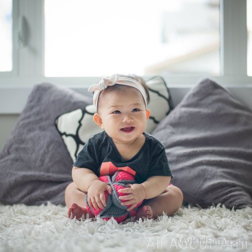 Lovely Baby Playing With Ball