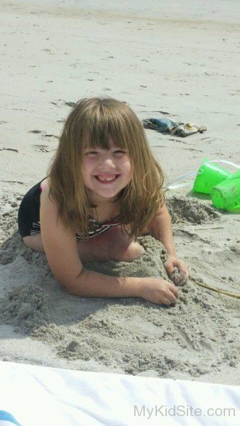 Pretty Kid On Beach