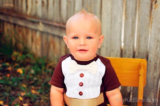 Baby Boy Sit On Yellow Chair-Sn12308