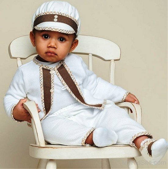 Baby Boy Sitting On Chair-MK456015