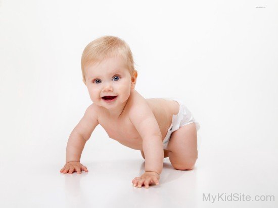 Baby Boy Sitting On Floor