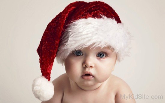 Baby Boy Wearing Santa Claus Cap