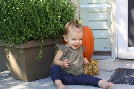 Baby Girl Sit On Floor