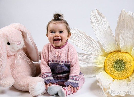 Baby Girl With Bunny