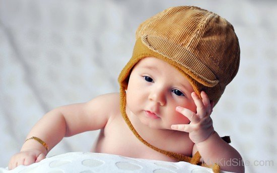 Baby Wearing Brown Hat