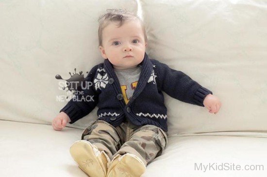 Boy Sitting On Sofa-Sn12319