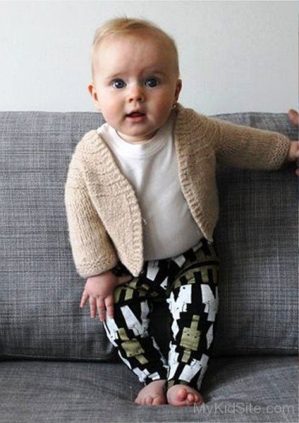 Cute Baby Boy Standing On Sofa-MK456050