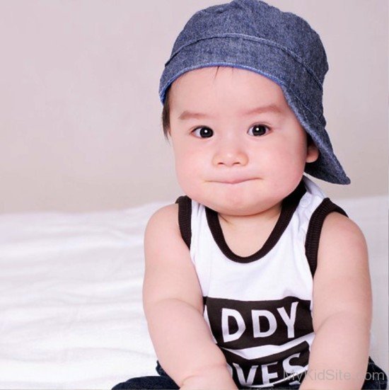 Cute Baby Boy Wearing Blue Cap